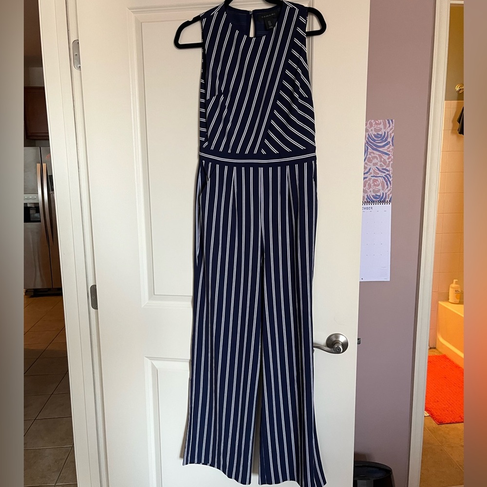 Tahari navy blue jumpsuit with white stripes